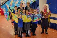 Thurrock 100 Stories launch - historian Mike Ostler with children and staff of Chadwell St Mary Primary